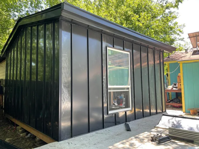 Black standing seam metal wall panels for Metal Roof Installation in Middleburg